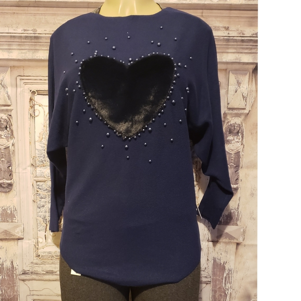 Pretty sweater.